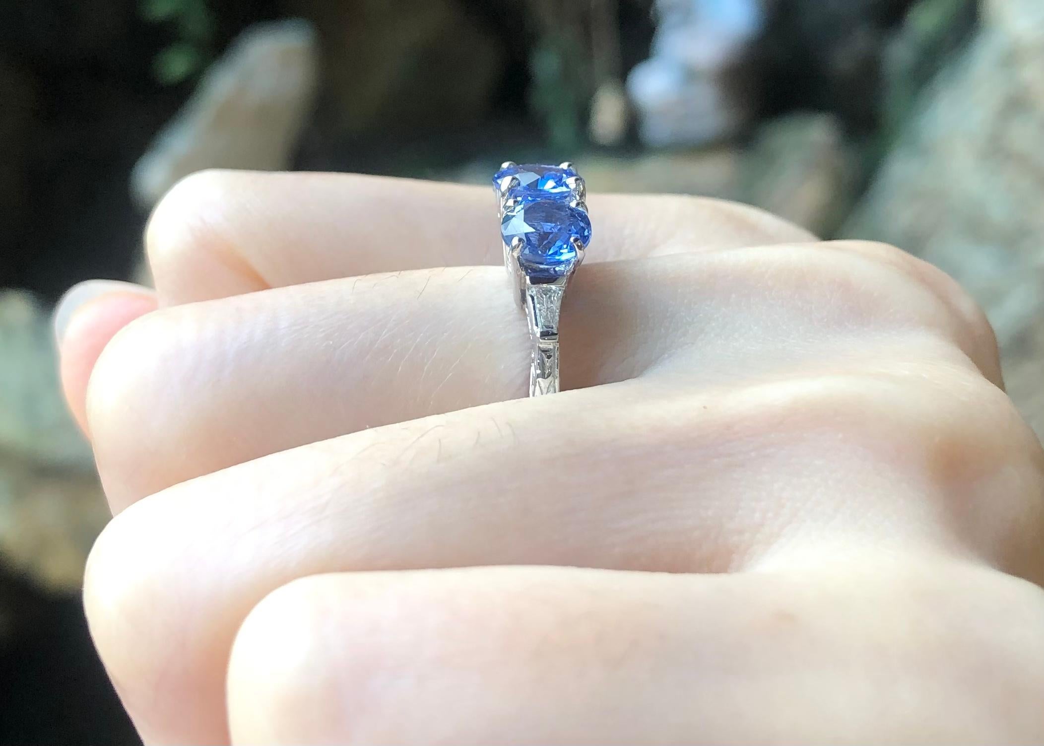 Contemporary Blue Sapphire with Diamond Ring Set in 18k White Gold Settings For Sale