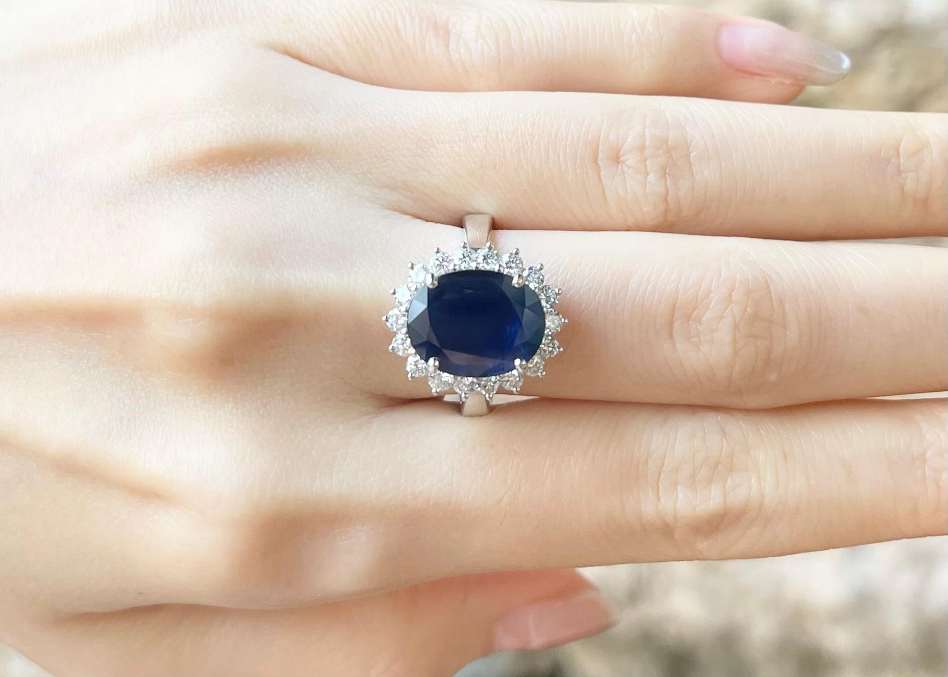 Contemporary Blue Sapphire with Diamond Ring set in 18K White Gold Settings For Sale