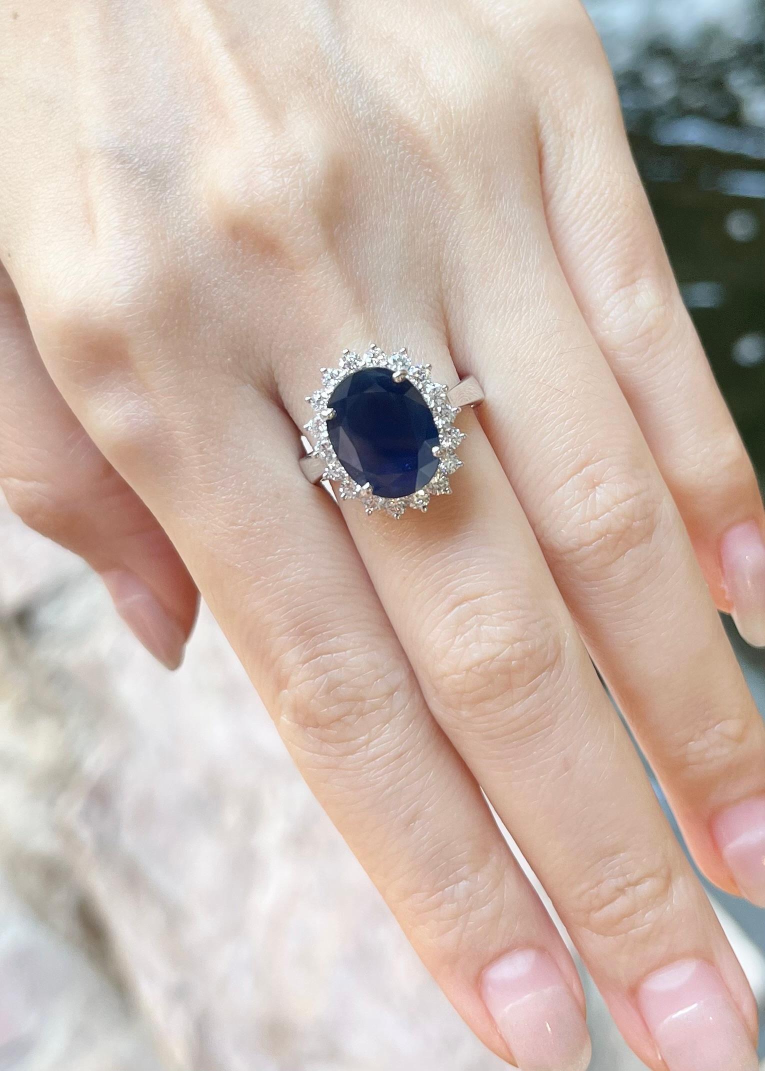 Oval Cut Blue Sapphire with Diamond Ring set in 18K White Gold Settings For Sale