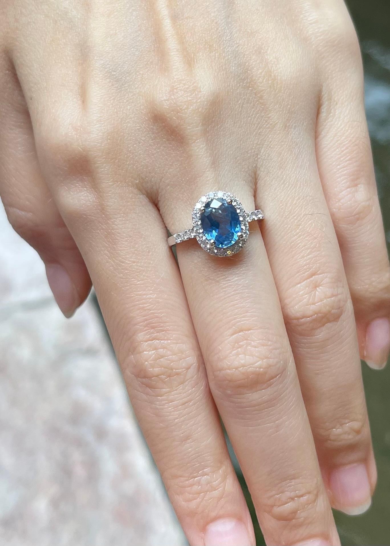 Oval Cut Blue Sapphire with Diamond Ring set in 18K White Gold Settings For Sale
