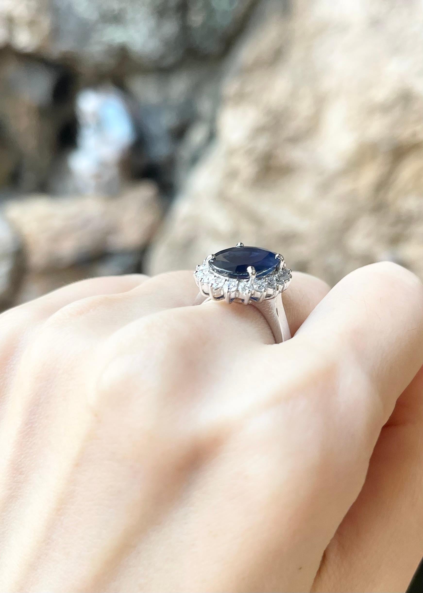 Women's Blue Sapphire with Diamond Ring set in 18K White Gold Settings For Sale