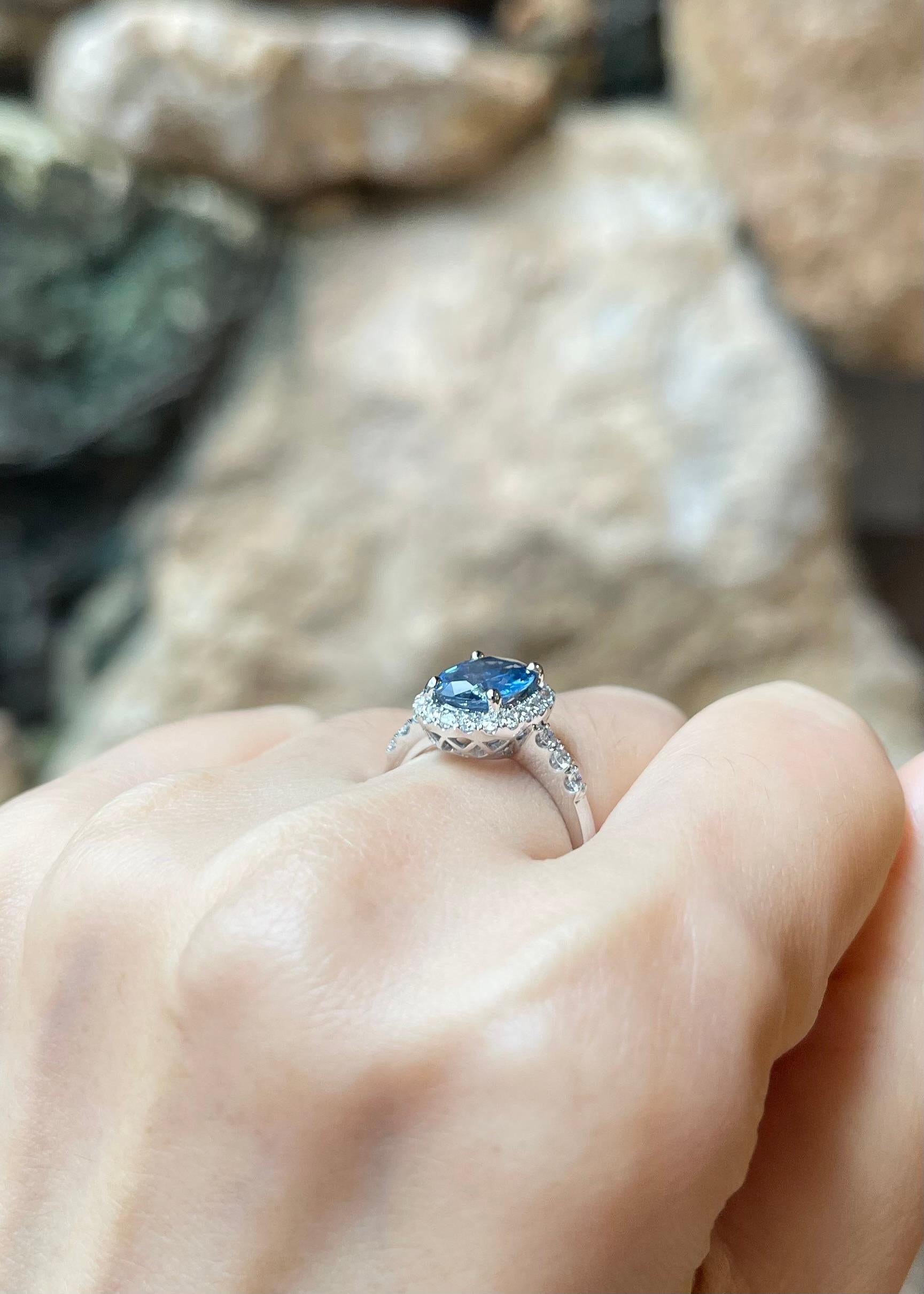 Women's Blue Sapphire with Diamond Ring set in 18K White Gold Settings For Sale