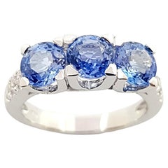 Blue Sapphire with Diamond Ring Set in 18k White Gold Settings