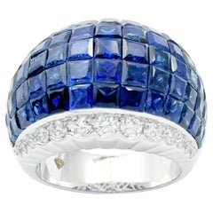 Anello con zaffiro blu e diamante con montatura in oro bianco 18 carati