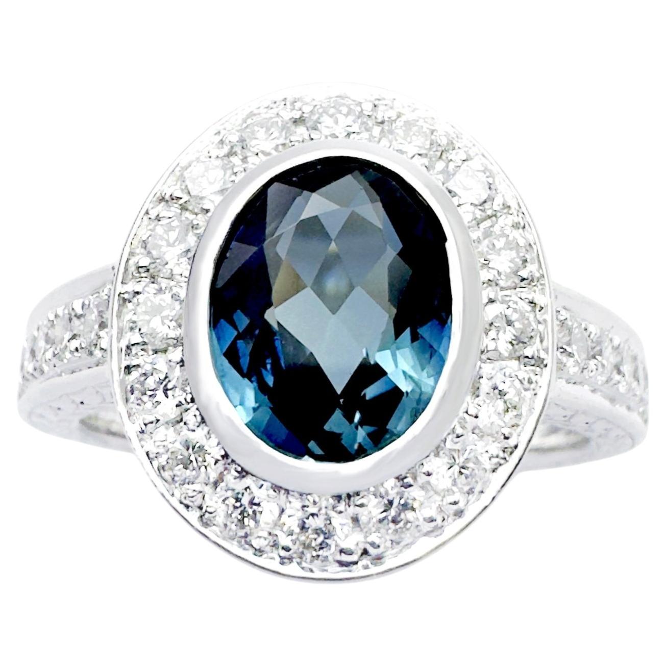 Blue Sapphire with Diamond Ring set in 18K White Gold Settings