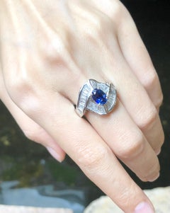 Blue Sapphire with Diamond Ring Set in Platinum 900 Settings