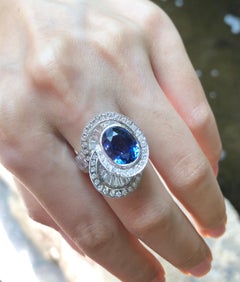 Blue Sapphire with Diamond Ring Set in Platinum 950 Settings