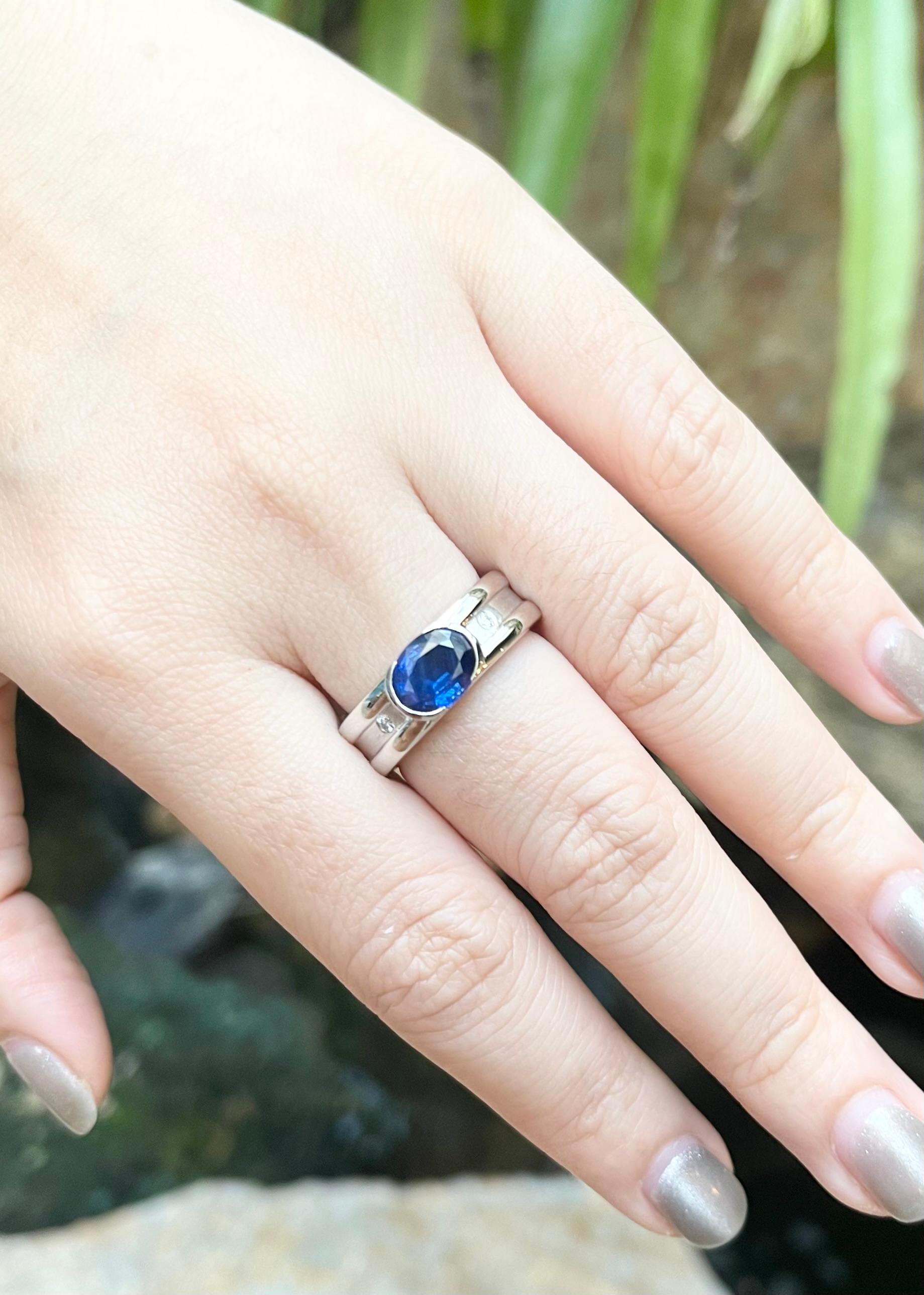 Contemporary Blue Sapphire with Diamond Ring set in Platinum 950 Settings For Sale