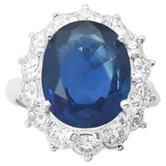 Anello con zaffiro blu e diamante con montatura in platino 950