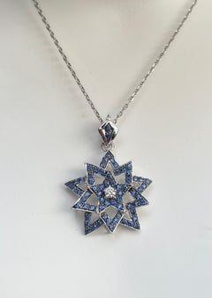 Blue Sapphire with Diamond Star/Flower Pendant set in 18K White Gold Settings
