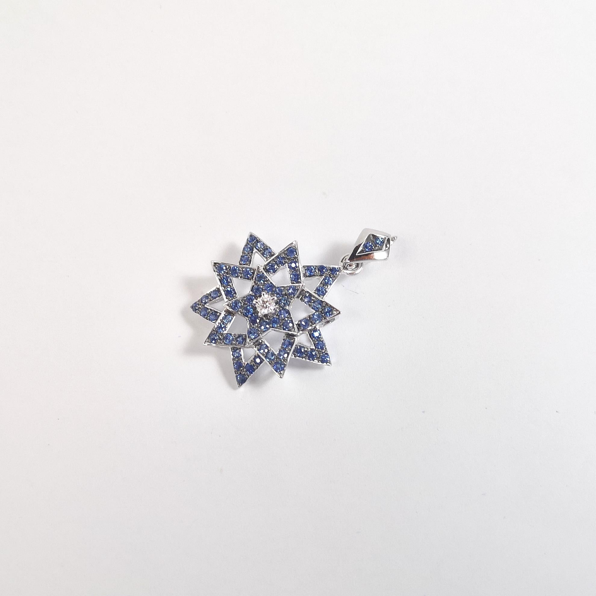 Taille brillant Pendentif étoile/feuille en or blanc 18 carats serti d'un saphir bleu et de diamants en vente
