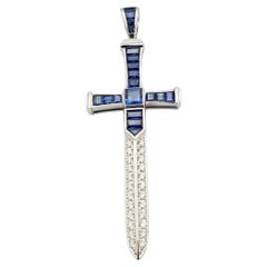 Blue Sapphire with Diamond Sword Pendant Set in 18 Karat White Gold Settings