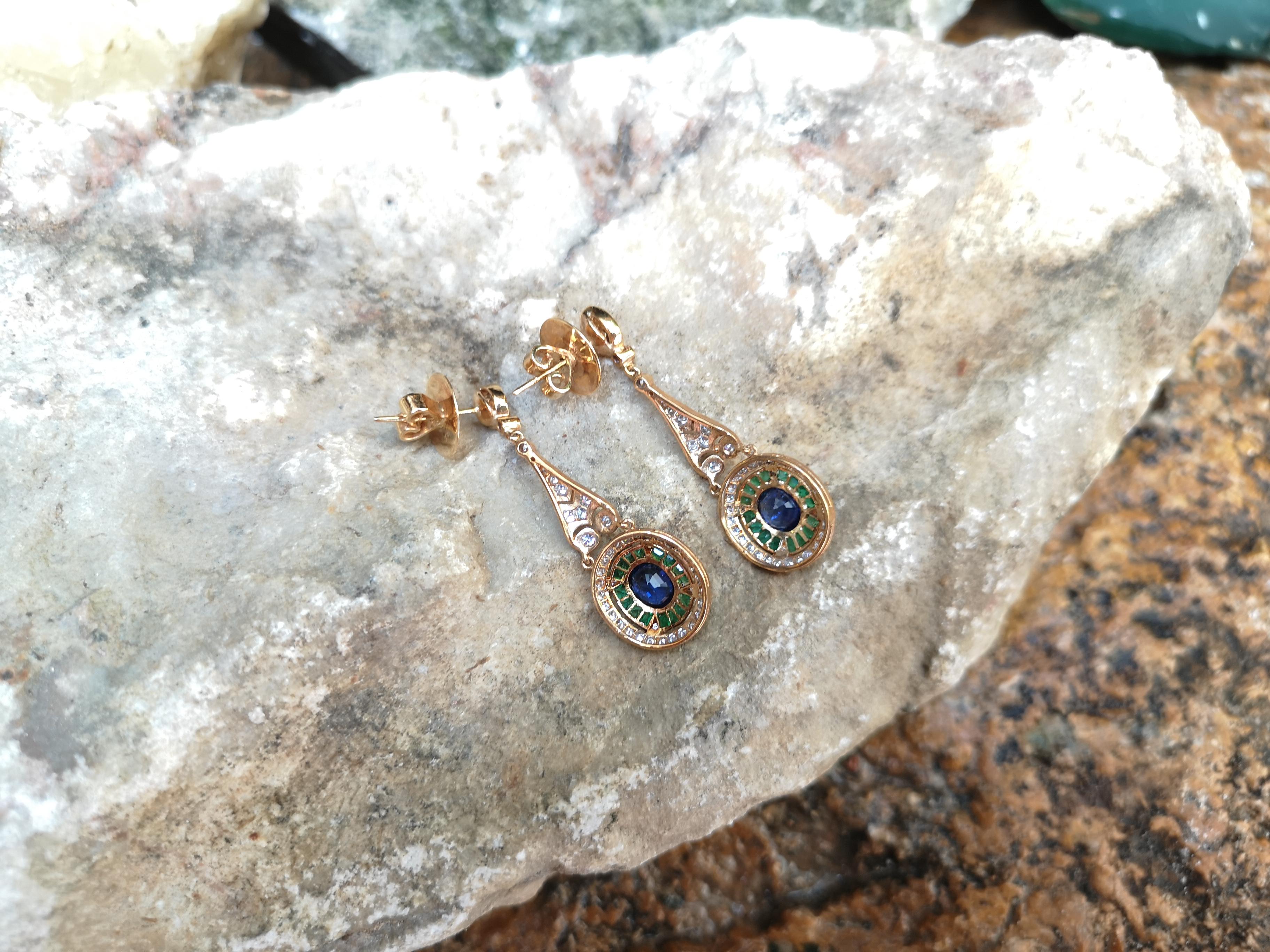 Oval Cut Blue Sapphire with Emerald and Diamond Earrings Set in 18 Karat Gold Settings