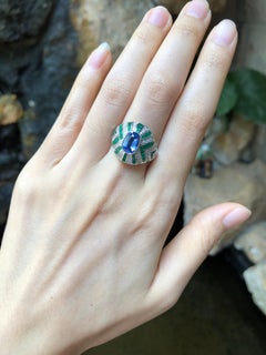 Blue Sapphire with Emerald and Diamond Ring Set in 18 Karat White Gold Settings