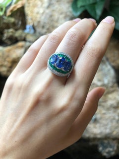 Blue Sapphire with Emerald and Diamond Ring Set in 18 Karat White Gold Settings