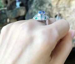 Blue Sapphire with Emerald and Diamond Ring Set in 18 Karat White Gold Settings