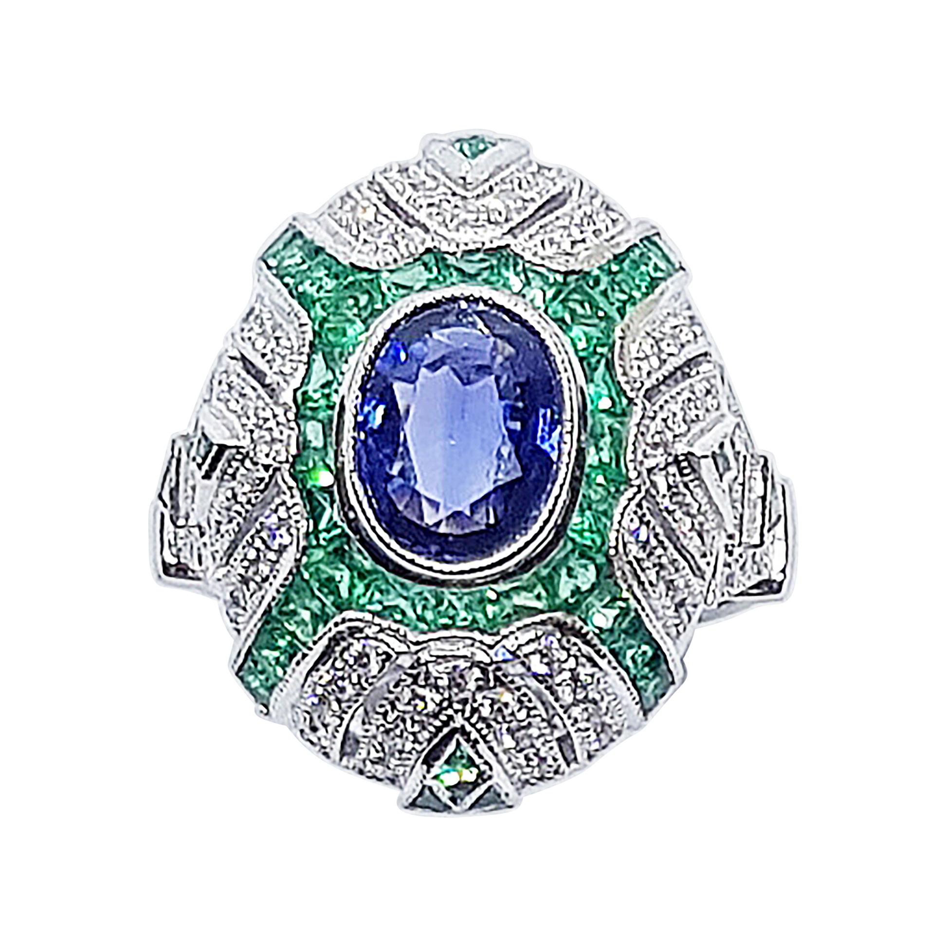 Blue Sapphire with Emerald and Diamond Ring Set in 18 Karat White Gold Settings