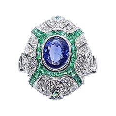 Ring mit blauem blauem Saphir mit Smaragd und Diamant in 18 Karat Weißgoldfassung