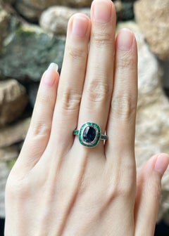 Blue Sapphire with Emerald Ring set in 18K White Gold Settings
