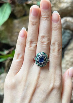Blue Sapphire with Emerald Ring set in 18K White Gold Settings