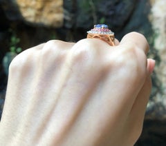 Blue Sapphire with Pink Sapphire and Diamond Ring Set in 18 Karat Rose Gold