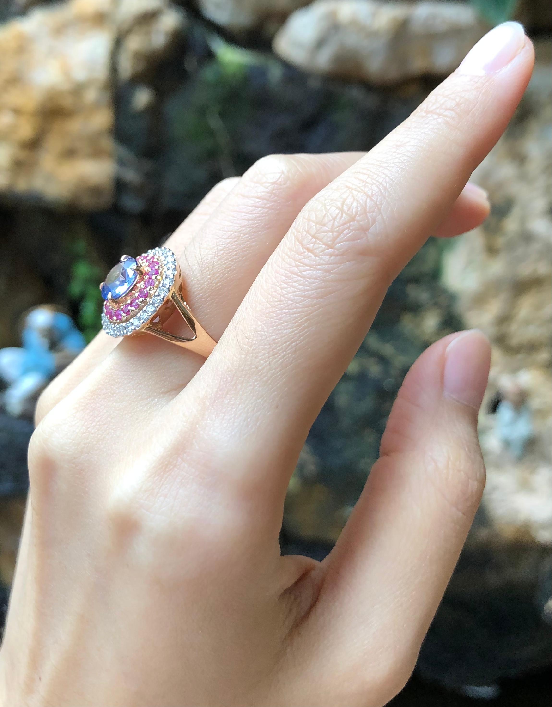 Contemporary Blue Sapphire with Pink Sapphire and Diamond Ring Set in 18 Karat Rose Gold For Sale