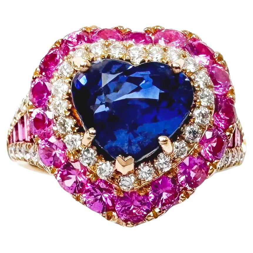 Bague en or rose 18 carats sertie de saphirs bleus, de saphirs roses et de diamants