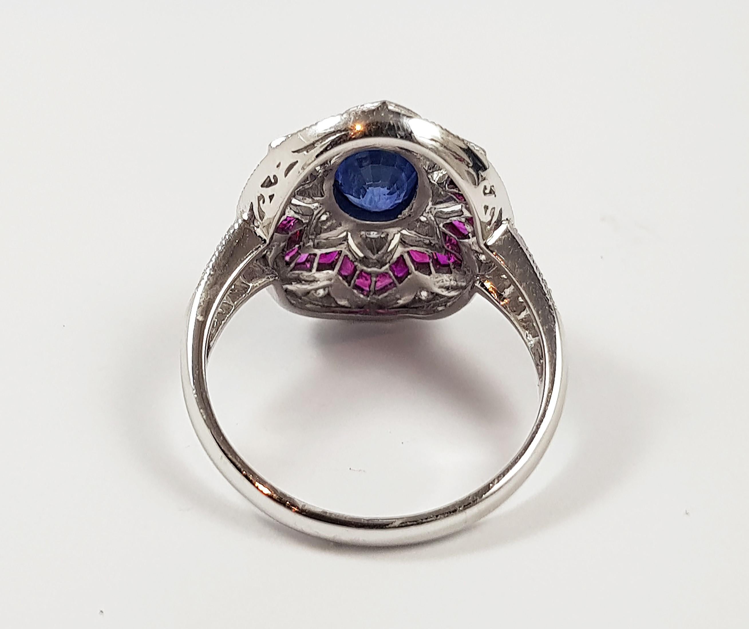 Blue Sapphire 1.09 carats with Ruby 1.98 carats and Diamond 0.25 carat Ring set in 18 Karat White Gold Settings

Width: 1.3 cm
Length: 1.7 cm 
Ring Size: 51

