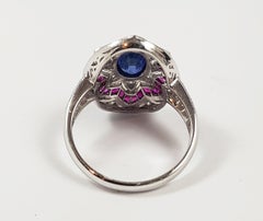Blue Sapphire with Ruby and Diamond Ring Set in 18 Karat White Gold Settings