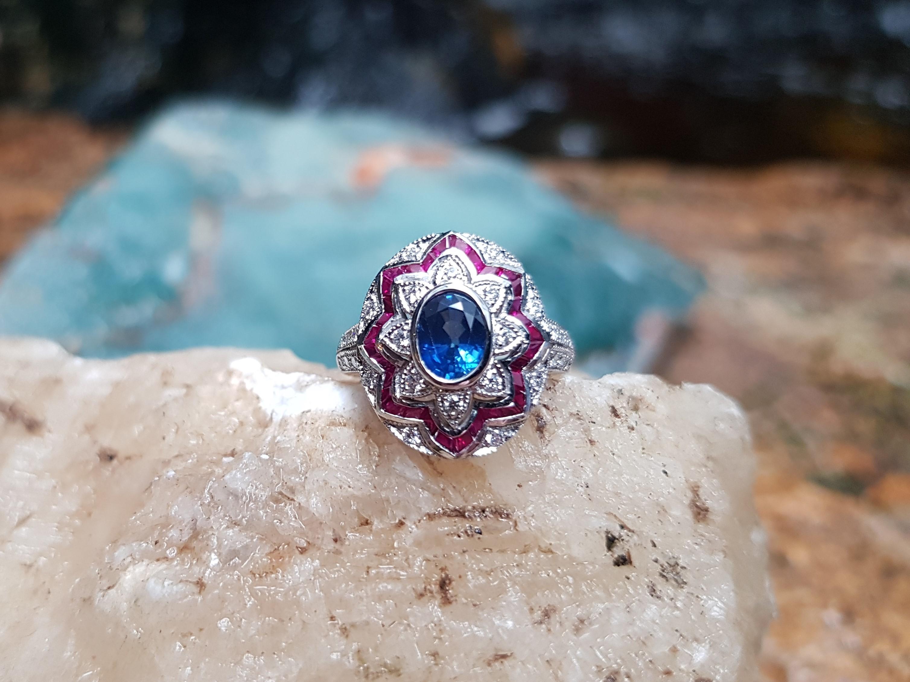 Oval Cut Blue Sapphire with Ruby and Diamond Ring Set in 18 Karat White Gold Settings For Sale