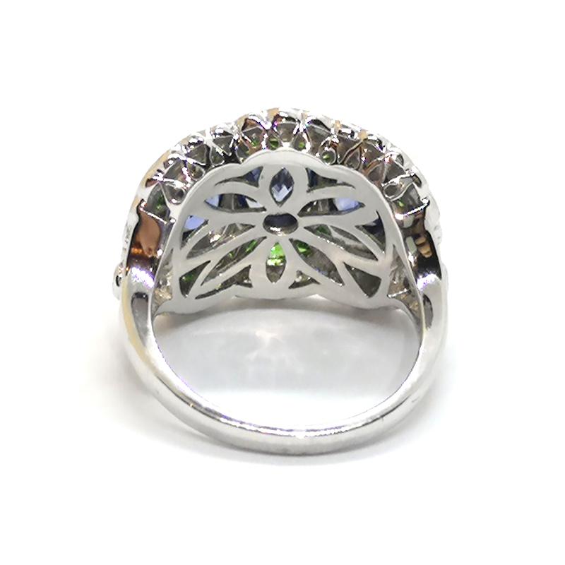 Oval Cut Blue Sapphire with Tsavorite and Diamond Ring Set in 18 Karat White Gold For Sale