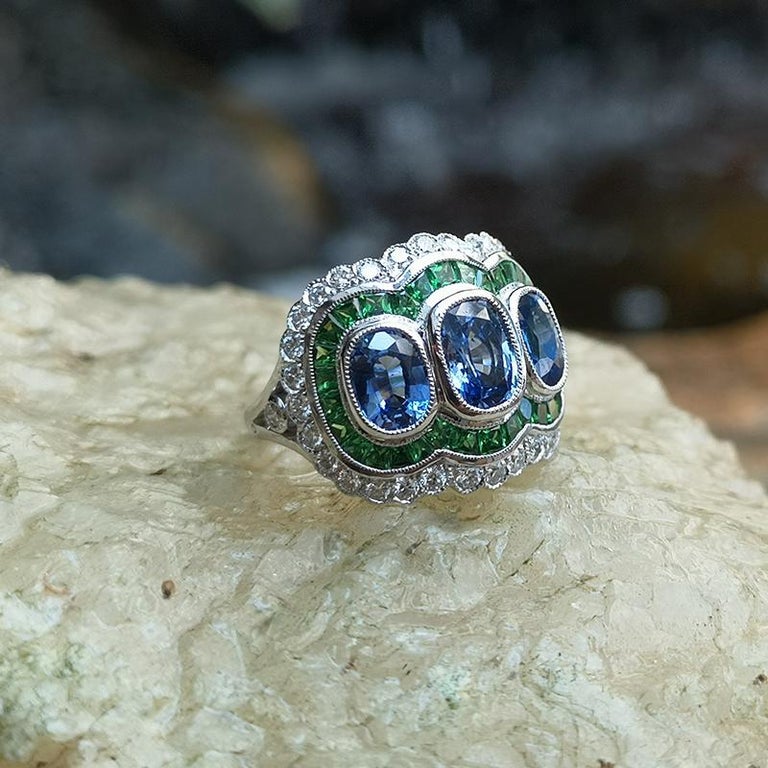 Women's Blue Sapphire with Tsavorite and Diamond Ring Set in 18 Karat White Gold For Sale