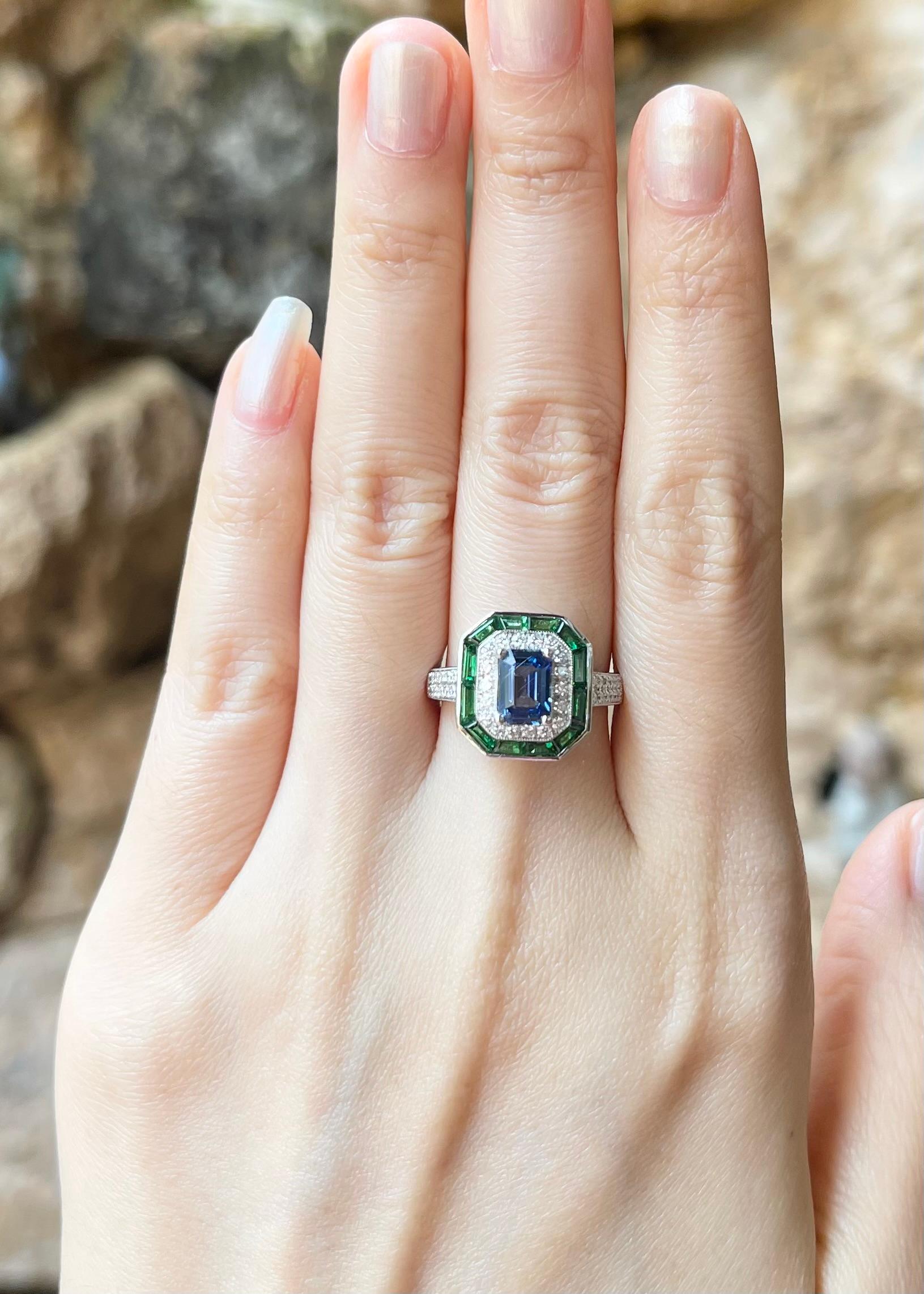 Blue Sapphire 1.05 carats with Tsavorite 0.88 carat and Diamond 0.33 carat Ring set in 18K White Gold Settings

Width:  1.2 cm 
Length: 1.4 cm
Ring Size: 53
Total Weight: 6.41 grams

