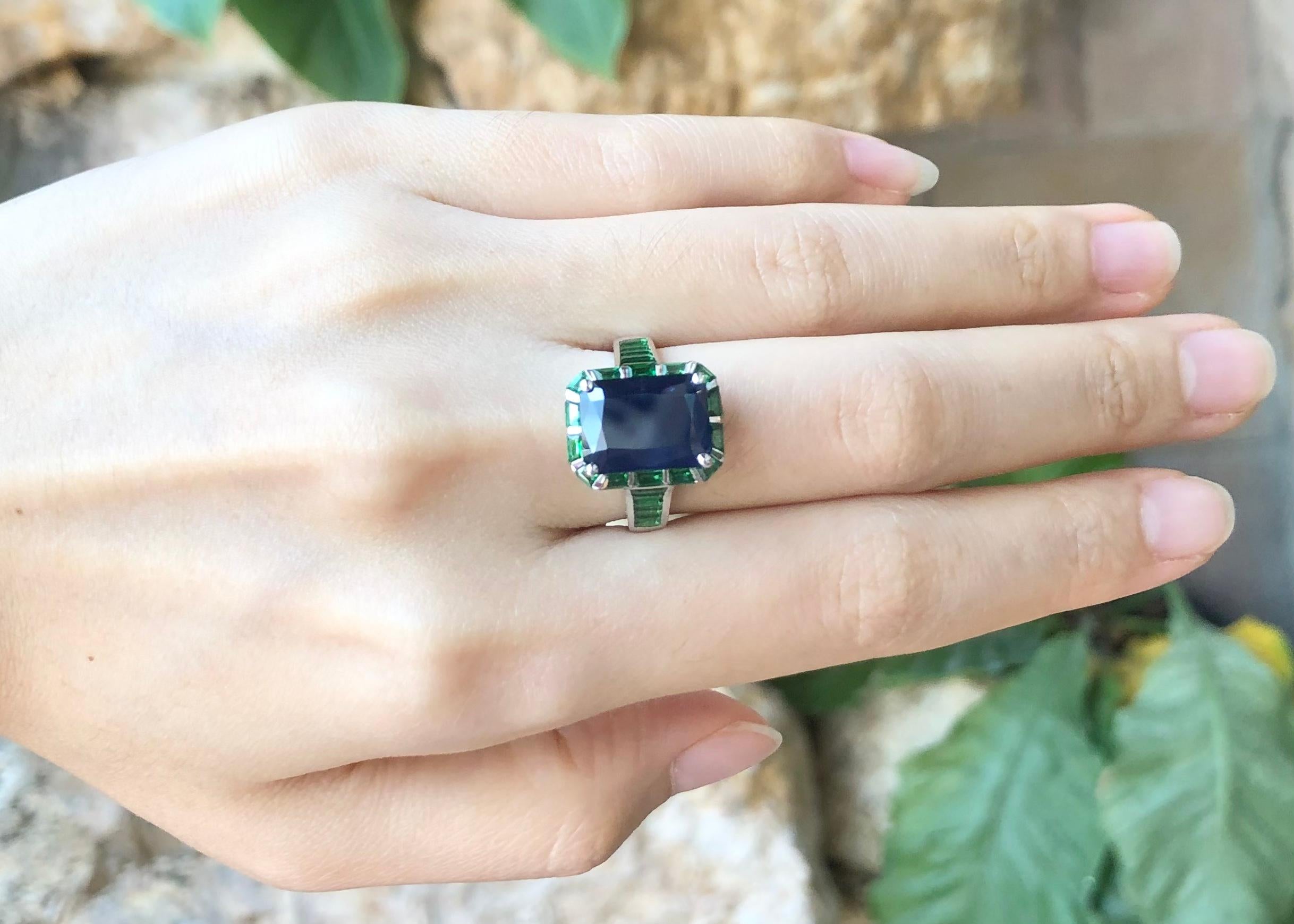 Blue Sapphire 5.68 carats with Tsavorite 2.11 carats Ring et in 18 Karat White Gold Settings

Width:  1.2 cm 
Length: 1.5 cm
Ring Size: 53
Total Weight: 7.33 grams



