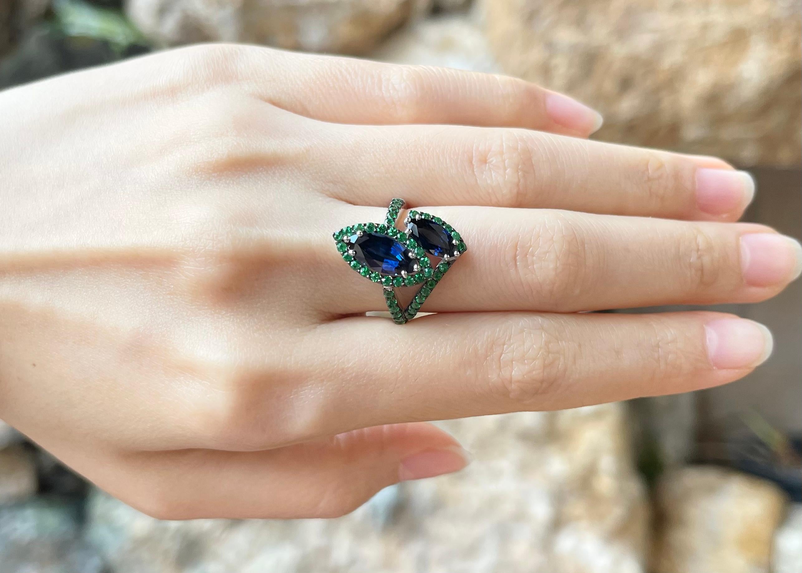 Blue Sapphire 3.01 carats with Tsavorite 0.83 carat Ring set in 18K White Gold Settings

Width:  1.3 cm 
Length: 2.0 cm
Ring Size: 52
Total Weight: 6.01 grams


