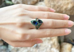 Blue Sapphire with Tsavorite Ring Set in 18k White Gold Settings
