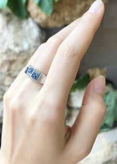 Blue Sapphire with White Topaz Ring set in Silver Settings