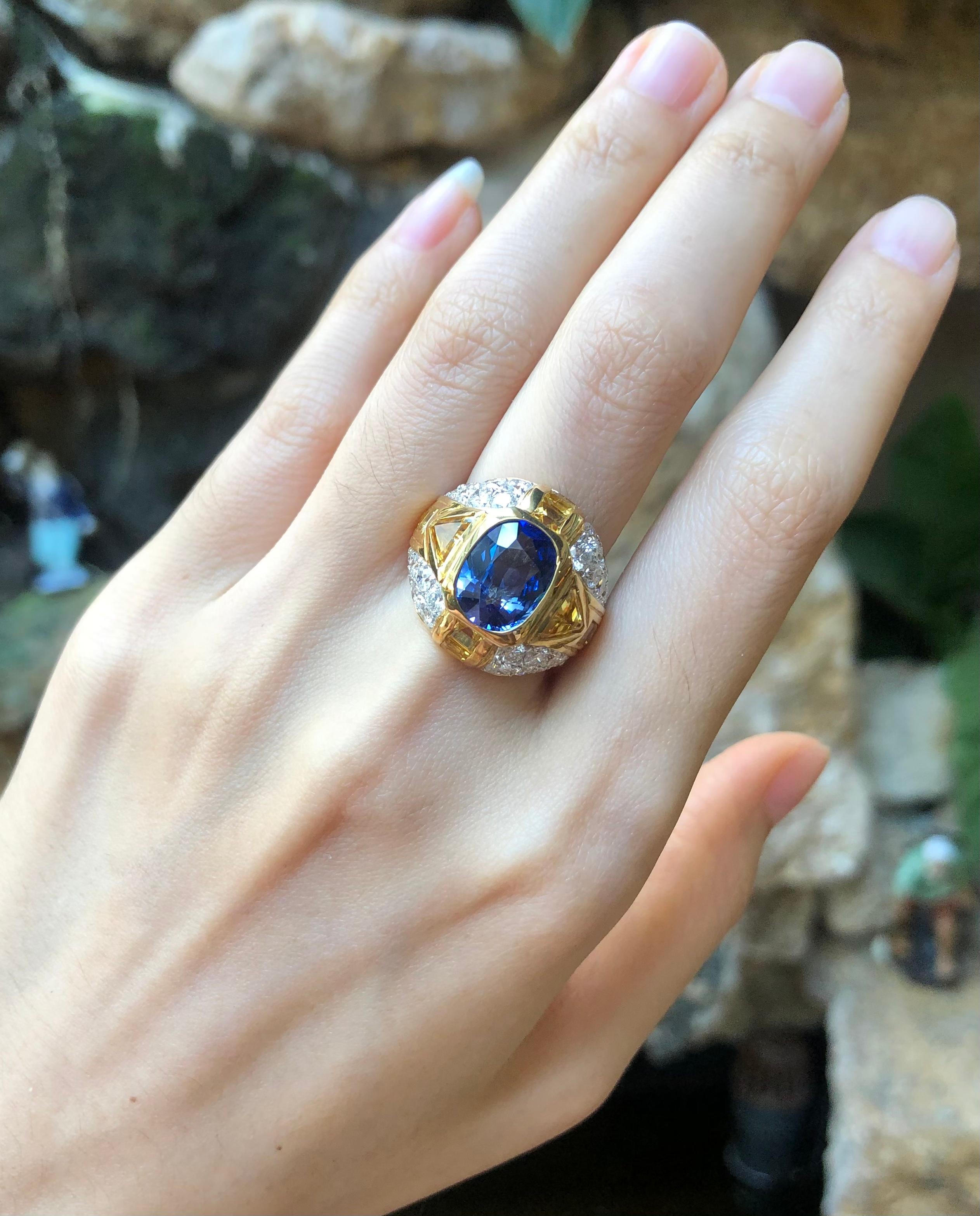 Blue Sapphire 4.68 carats with Yellow Sapphire 3.29 carats and Diamond 1.44 carats Ring set in 18 Karat Gold Settings

Width:  1.0 cm 
Length: 1.2 cm
Ring Size: 54
Total Weight: 13.45 grams

