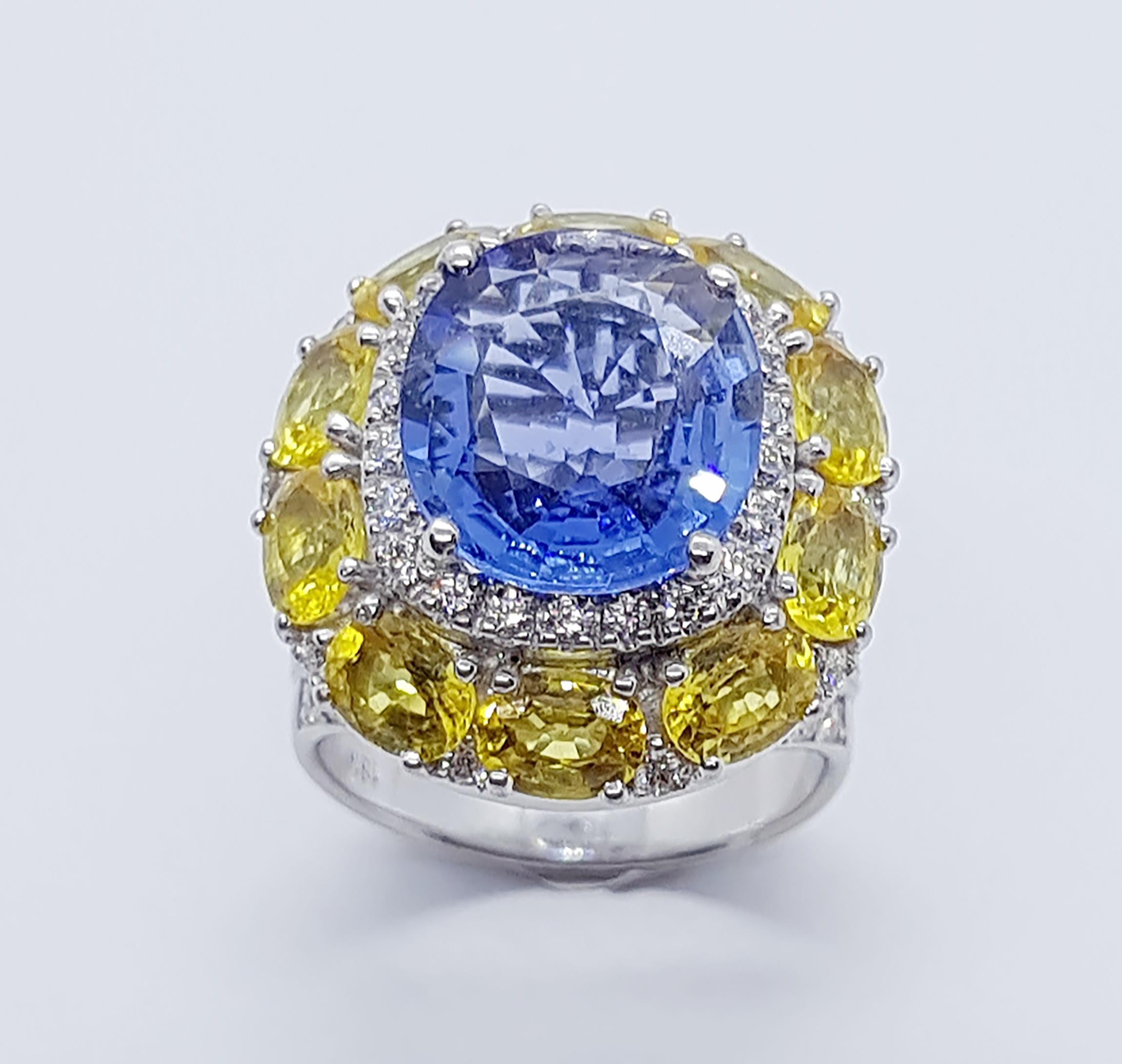 Blue Sapphire 5.27 carats with Yellow Sapphire 6.75 carats and Diamond 0.90 carat Ring set in 18 Karat White Gold Settings

Width:  1.9 cm 
Length: 2.1 cm
Ring Size: 52
Total Weight: 14.81 grams

