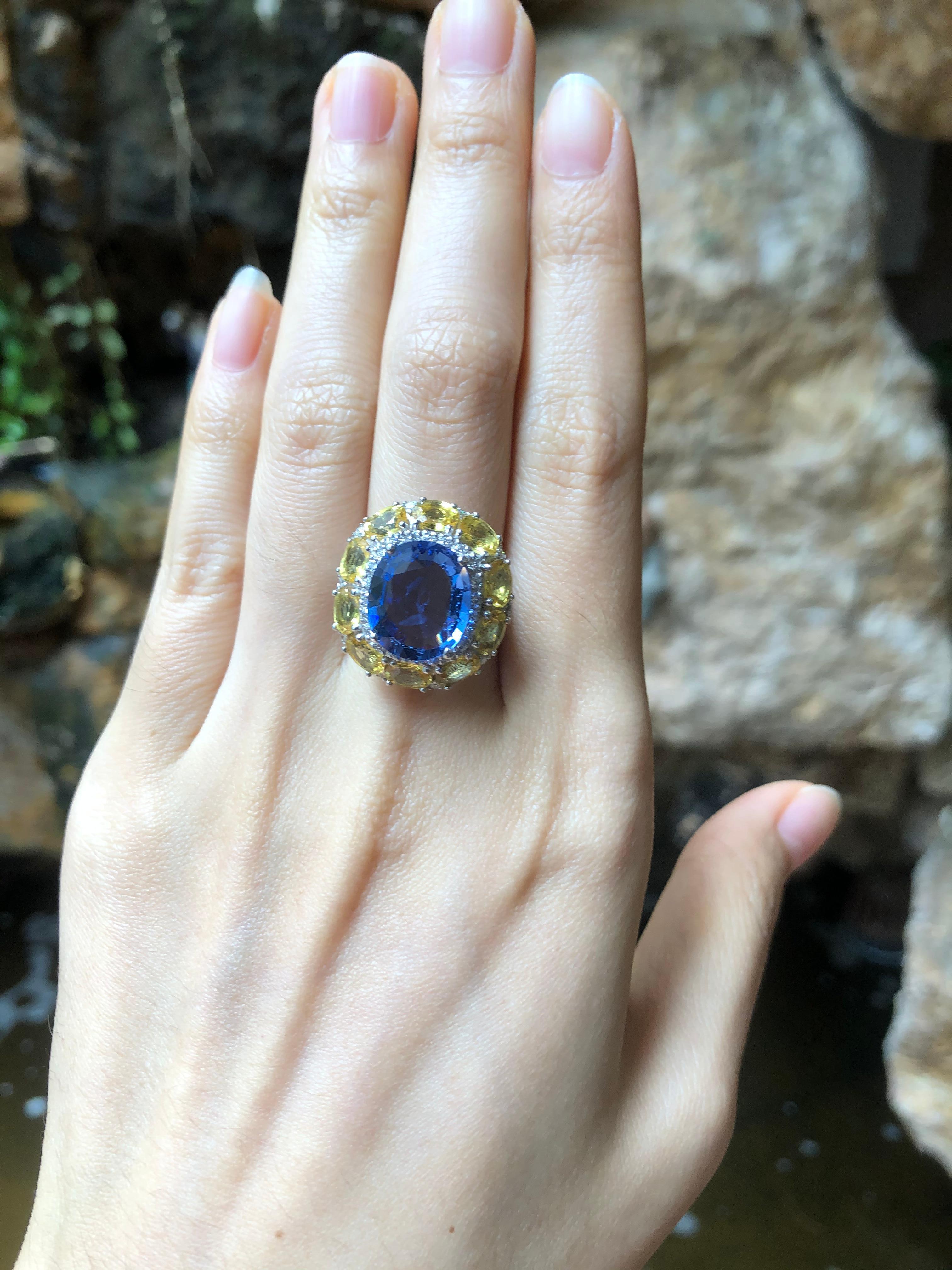 Oval Cut Blue Sapphire with Yellow Sapphire and Diamond Ring Set in 18 Karat White Gold