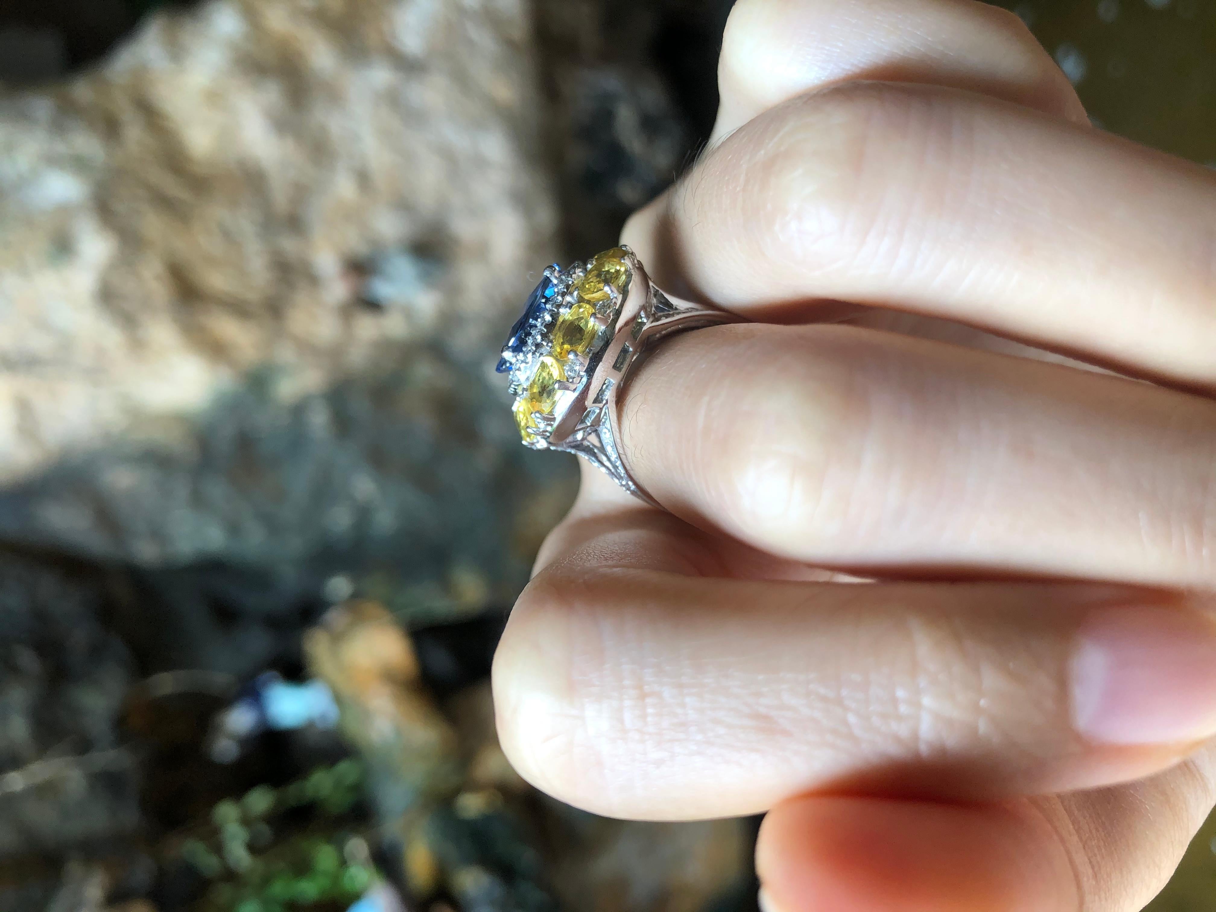 Blue Sapphire with Yellow Sapphire and Diamond Ring Set in 18 Karat White Gold 1