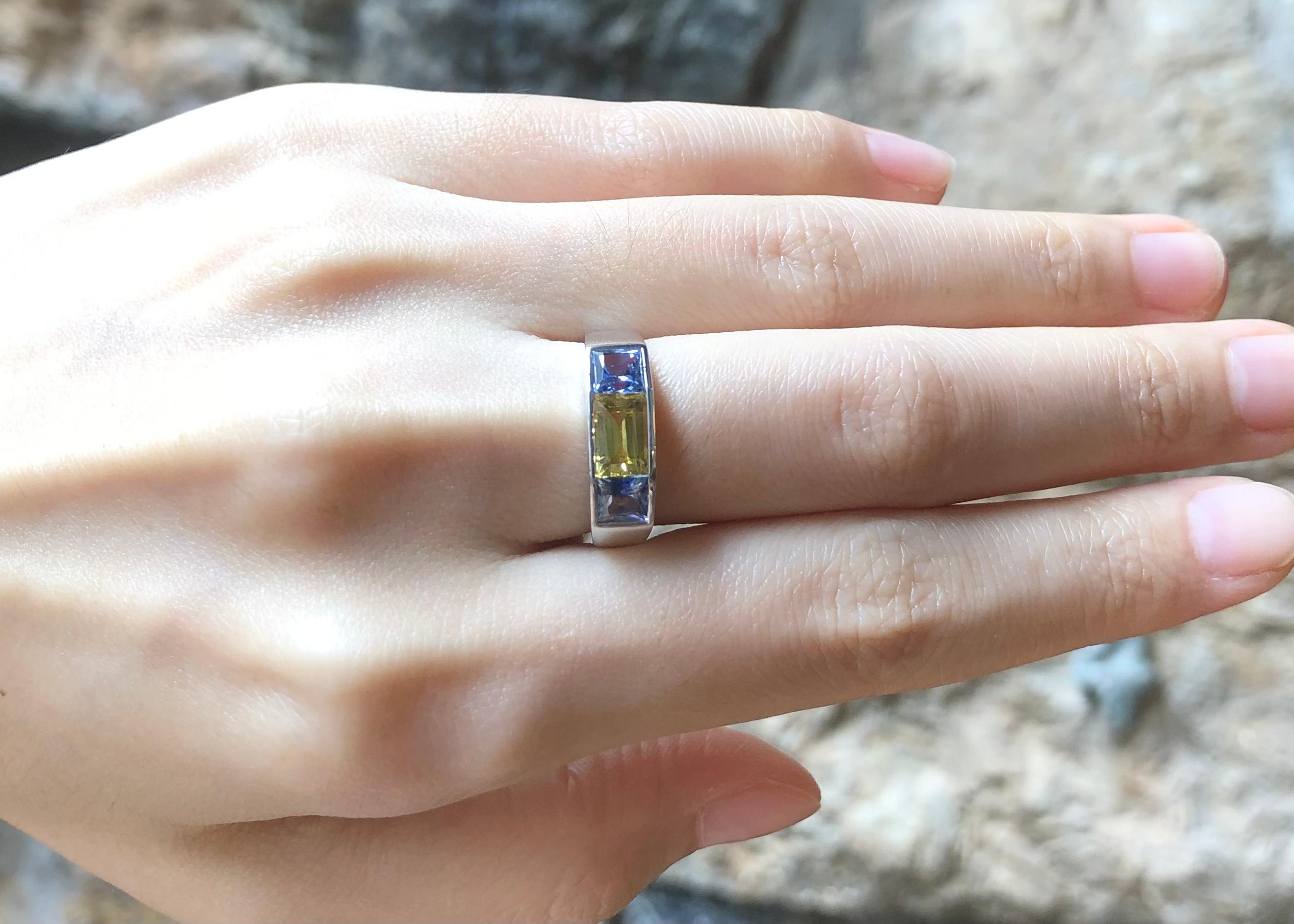 Blue Sapphire 1.13 carats with Yellow Sapphire 1.17 carats Ring set in 18K White Gold Settings

Width:  1.6 cm 
Length: 0.5 cm
Ring Size: 54
Total Weight: 5.25 grams

