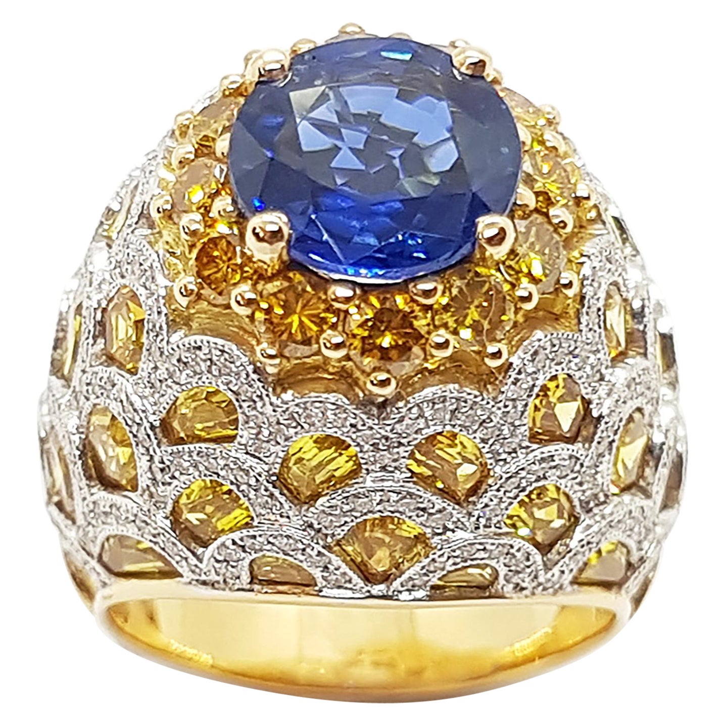 Anello con zaffiro blu, zaffiro giallo, diamante giallo e diamante in oro 18 carati