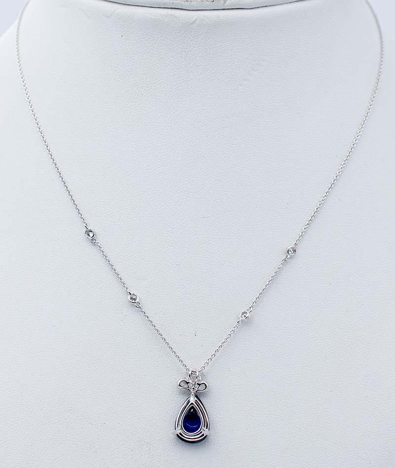 Mixed Cut Blue Sapphire, Diamonds, 18 Karat White Gold Pendant Necklace For Sale