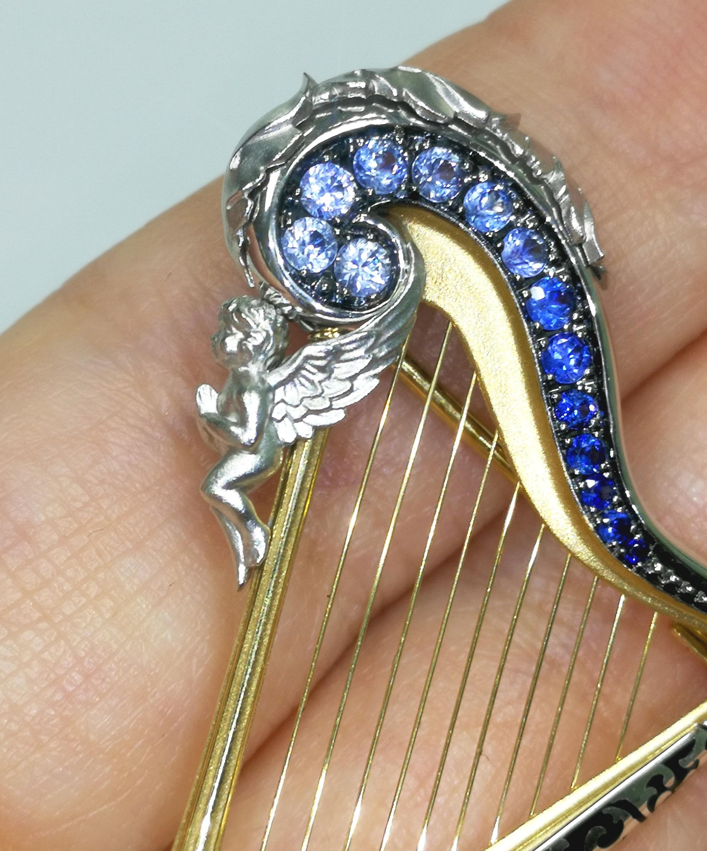 Contemporary Blue Sapphires 18 Karat White Gold Harp Brooch For Sale