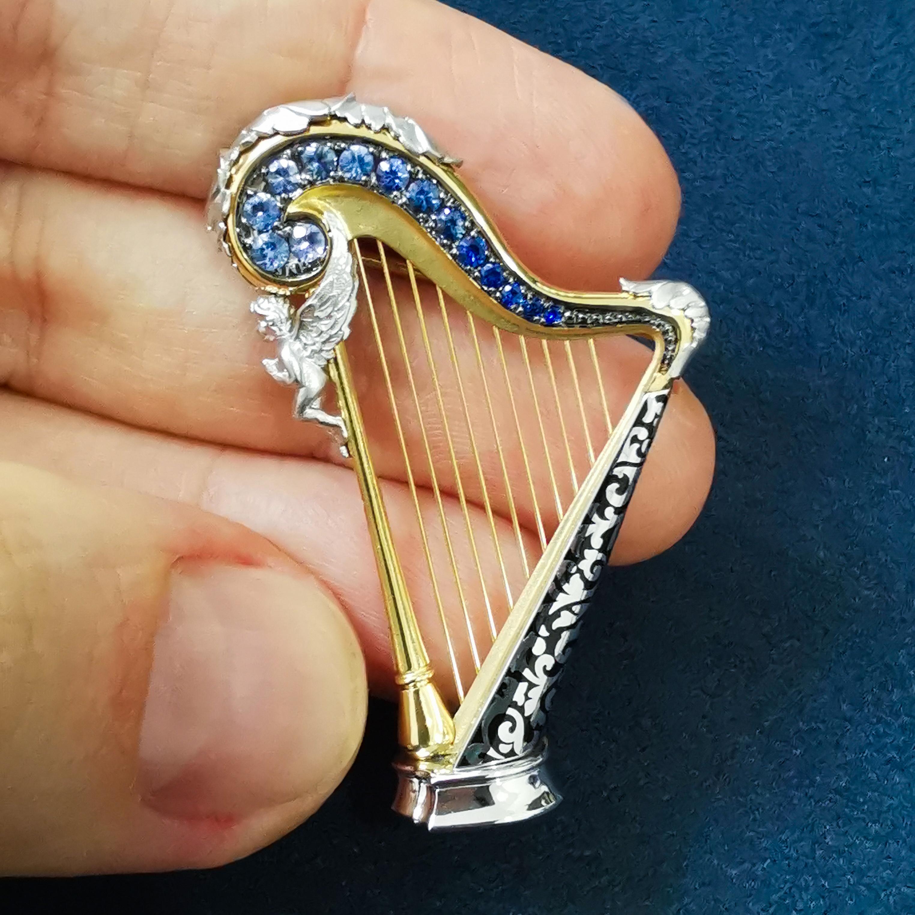 Contemporary Blue Sapphires 18 Karat White Yellow Gold Harp Brooch For Sale