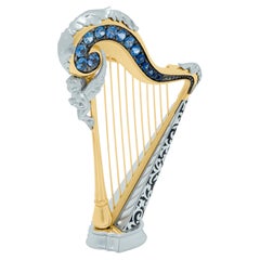 Used Blue Sapphires 18 Karat White Yellow Gold Harp Brooch