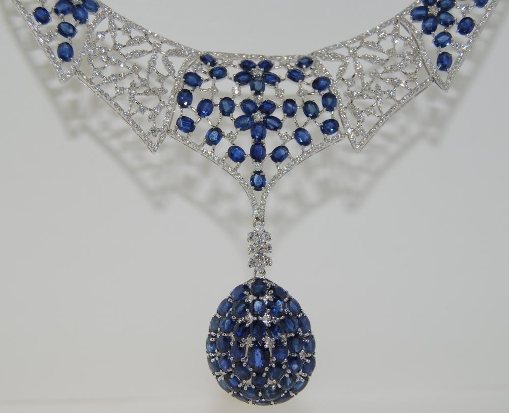This necklace with 24.39 carat Blue Sapphires and 5.17 carat White Brilliant Diamonds is crafted in 14 Karat White Gold.  Length 18 inches.