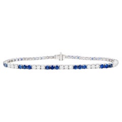 Blue Sapphires and Diamonds Tennis Bracelet Round Cut 5.3 Carats 18K Gold