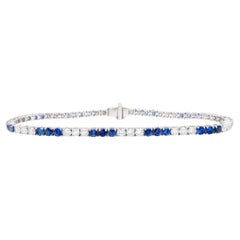 Blue Sapphires and Diamonds Tennis Bracelet Round Cut 5.3 Carats 18K Gold